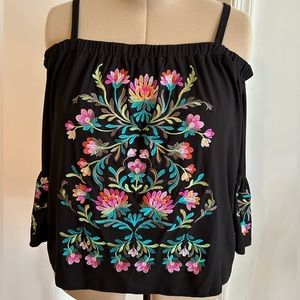 FUN flirty top! INC off the shoulder black with multicolored floral design.